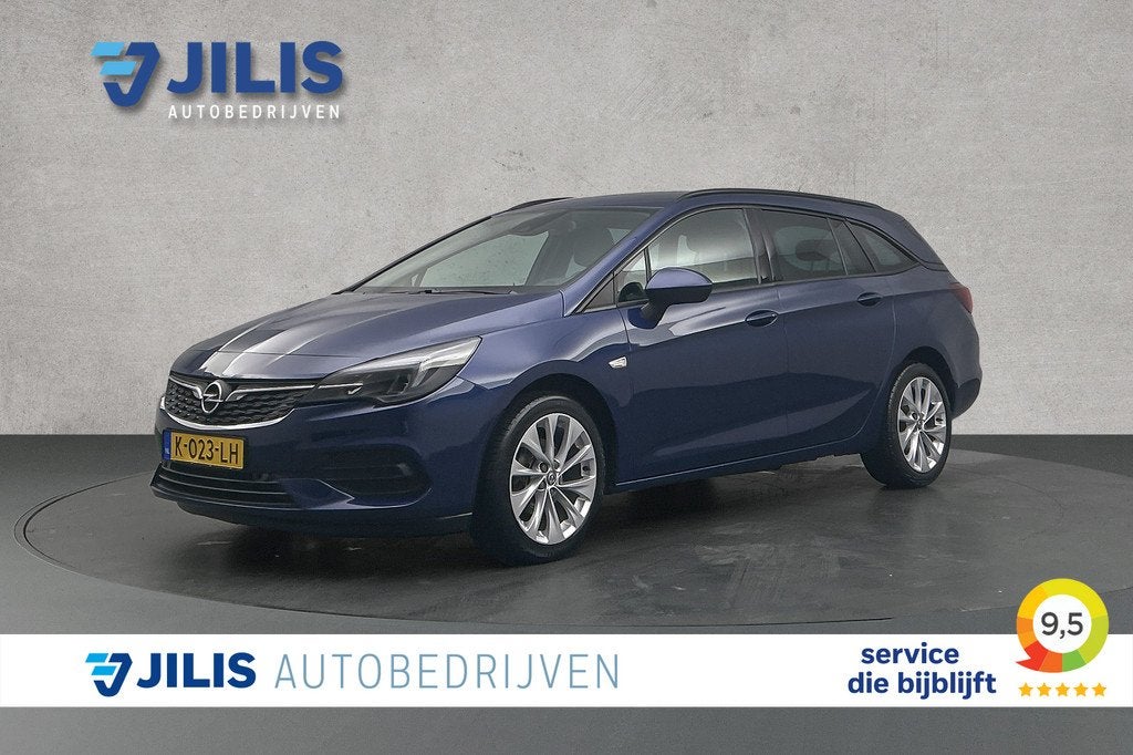 Opel Astra Sports Tourer 1.2 Business Elegance | Half leder, Auto's, Voorwielaandrijving, 12 maanden, Gebruikt, Euro 6