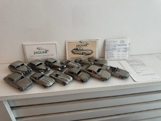 1:43 Tinnen Danbury Mint Jaguar Modellen 12 stuks, Ophalen of Verzenden, Gebruikt, Auto, Overige merken