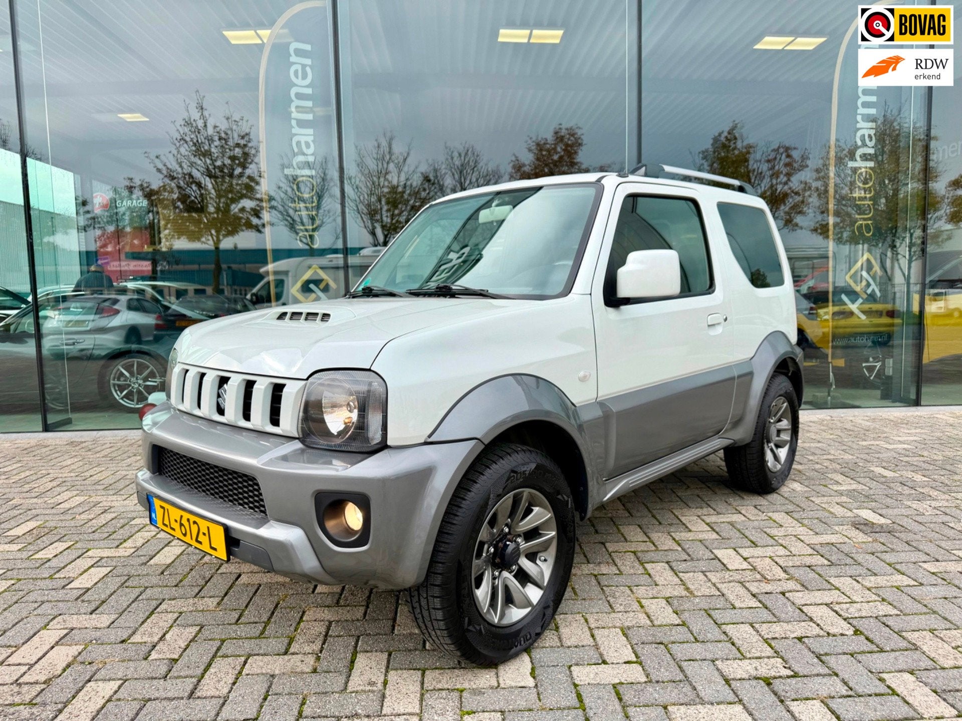 Suzuki Jimny 1.3 Exclusive 4WD, Airco, Leer, Trekhaak, Auto's, Euro 5, Zwart, 4 stoelen, Wit
