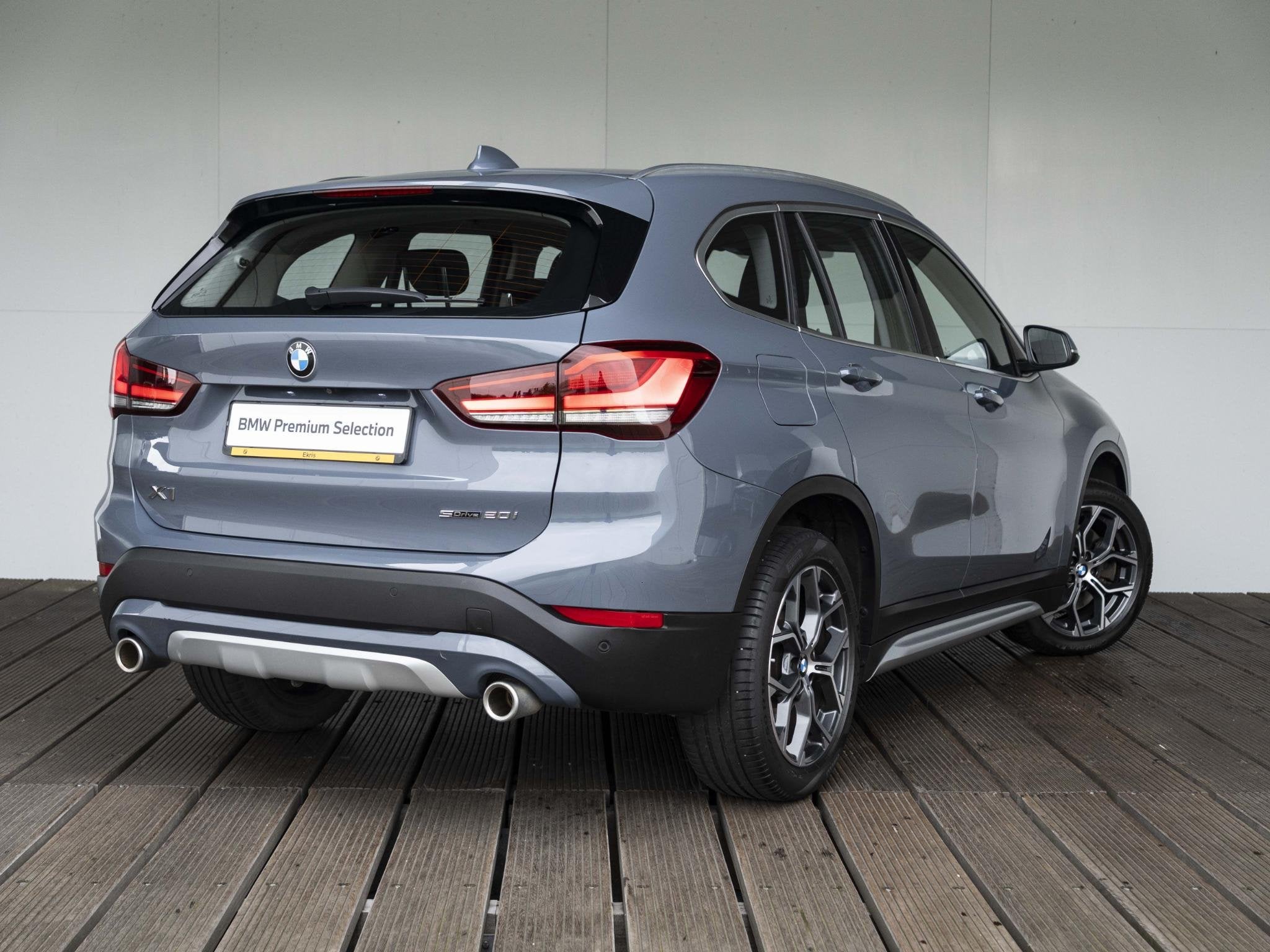 BMW X1 sDrive20i | High Executive | Orange Edition | Achteru, Auto's, BMW, 1998 cc, 4 cilinders, Met garantie (alle), Bedrijf