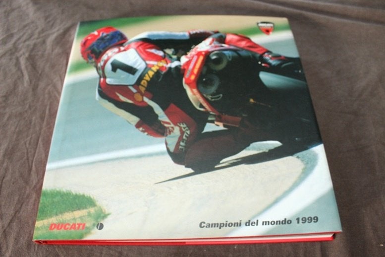 Ducati Corse Campioni del Mondo 1999, Ophalen of Verzenden, Gelezen