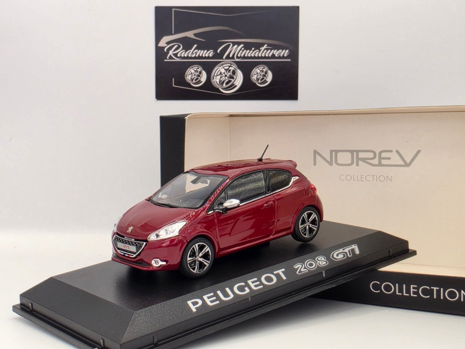 Peugeot 208 GTi - Rouge Rubis - 1:43 Norev, Hobby en Vrije tijd, Modelauto's | 1:43, Auto, Norev, Ophalen of Verzenden, Zo goed als nieuw