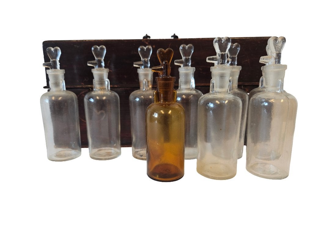 Antieke apothekerskist met 9 stolpflesjes, Ophalen