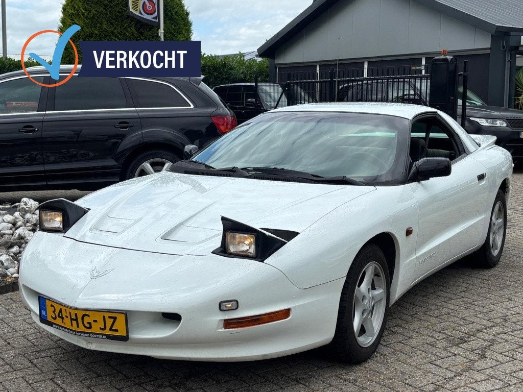Pontiac Firebird 3.4 SE V6 Wit 1994 Handgeschakeld Apk 2028, Auto's, Pontiac, Wit, Bedrijf, Coupé