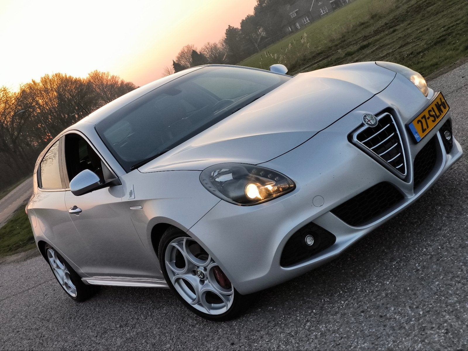 Alfa Romeo Giulietta QV 1.75 TBI 2011 Grijs, Auto's, Alfa Romeo, 1295 kg, 4 cilinders, Origineel Nederlands, Handgeschakeld