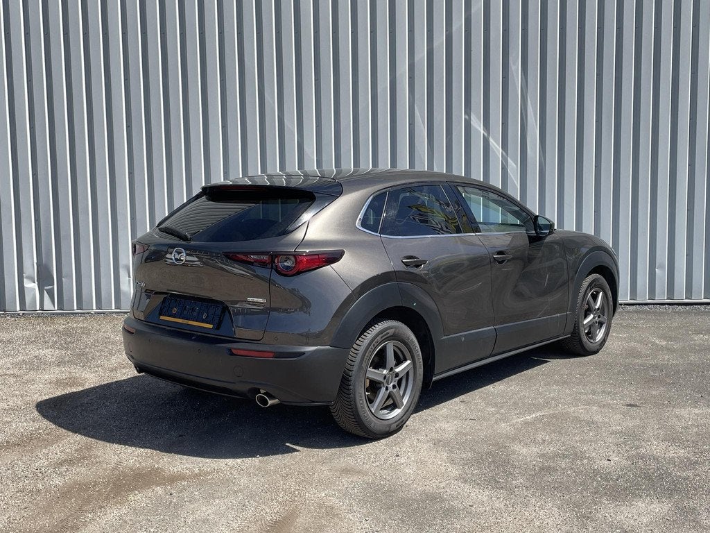 Mazda CX-30 2.0 e-SkyActiv-G M Hybrid Homura | Trekhaak afne, 1998 cc, Stof, 4 cilinders, Bedrijf