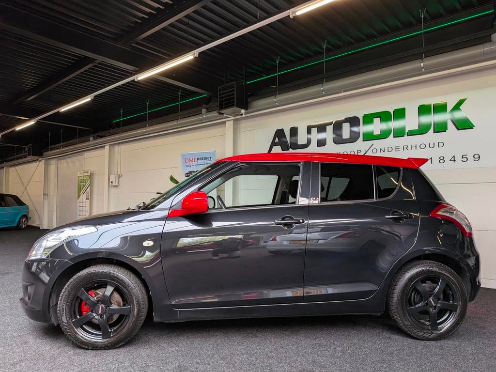 Suzuki Swift 1.2 Bandit Black&Red Edition | Carplay Android, Voorwielaandrijving, Stof, Gebruikt, 4 cilinders