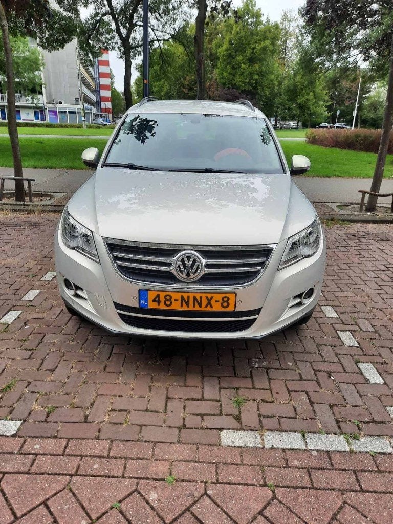 Volkswagen Tiguan 1.4 TSI 110KW 2010 Grijs, Auto's, Volkswagen, Voorwielaandrijving, 15 km/l, 1800 kg, Zwart