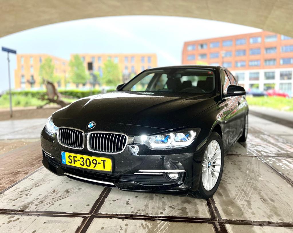 BMW 3-Serie 318i 136pk Aut 2018 Zwart, Auto's, Automaat, Zwart, Origineel Nederlands, 19 km/l