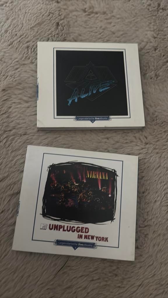 Nirvana unplugged in  new york/ alive, Ophalen of Verzenden, Zo goed als nieuw