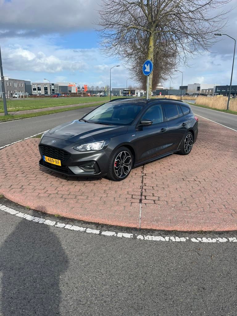 Ford Focus 1.0 Ecoboost Hybrid 125pk 2021 Grijs, Auto's, Ford, Adaptieve lichten, Leder en Stof, Origineel Nederlands, 19 km/l