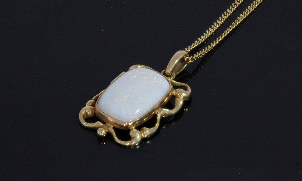 Opaal edelsteen fraaie 14k gouden ketting hanger vintage, Voordeelsieraden, Ophalen of Verzenden, Zo goed als nieuw, Met edelsteen