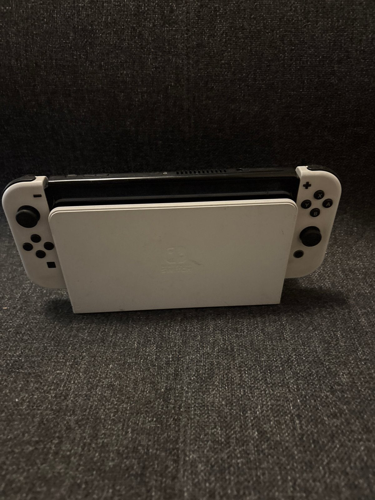 Nintendo Switch OLED met 3 controllers