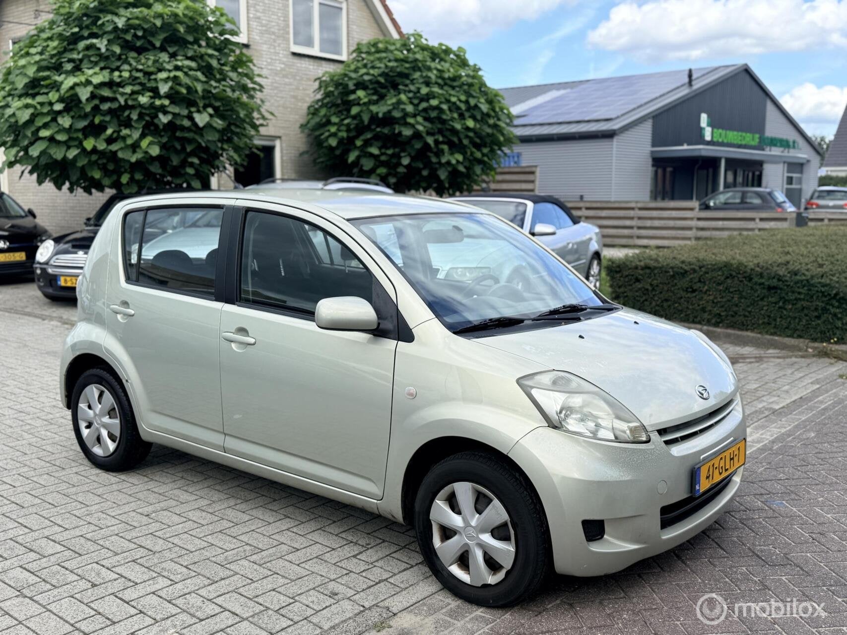 Daihatsu Sirion 2 1.0-12V Premium, Auto's, Voorwielaandrijving, Gebruikt, Elektrische ramen, Beige
