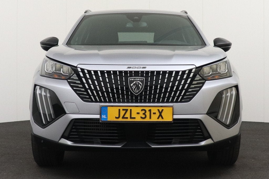 Peugeot 2008 158 PK Aut. Hybrid Allure Half-Leder Climate Ca, Auto's, Peugeot, 1272 kg, Gebruikt, 1199 cc, Leder en Stof