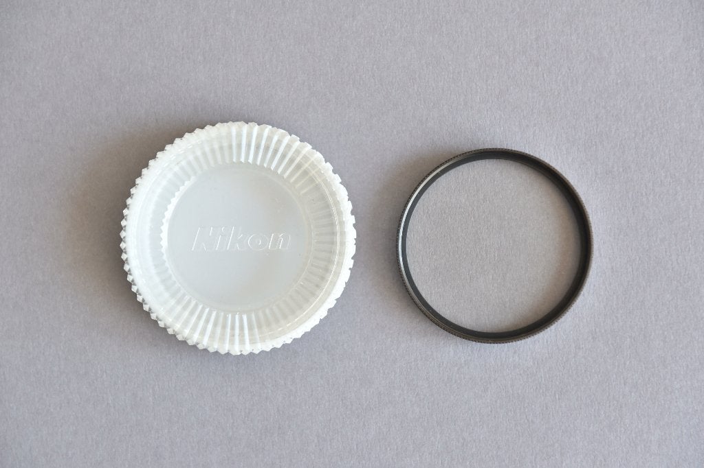Nikon L39 UV filter in Nikon CP-3 cassette, UV-filter, Inclusief opbergcase, Ophalen of Verzenden, Zo goed als nieuw