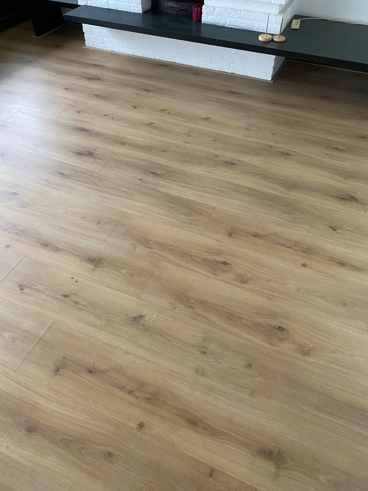 Mooie lichtbruine laminaatvloer 12 sep eruit - 80m², Huis en Inrichting, Stoffering | Vloerbedekking, Ophalen, Gebruikt, Bruin