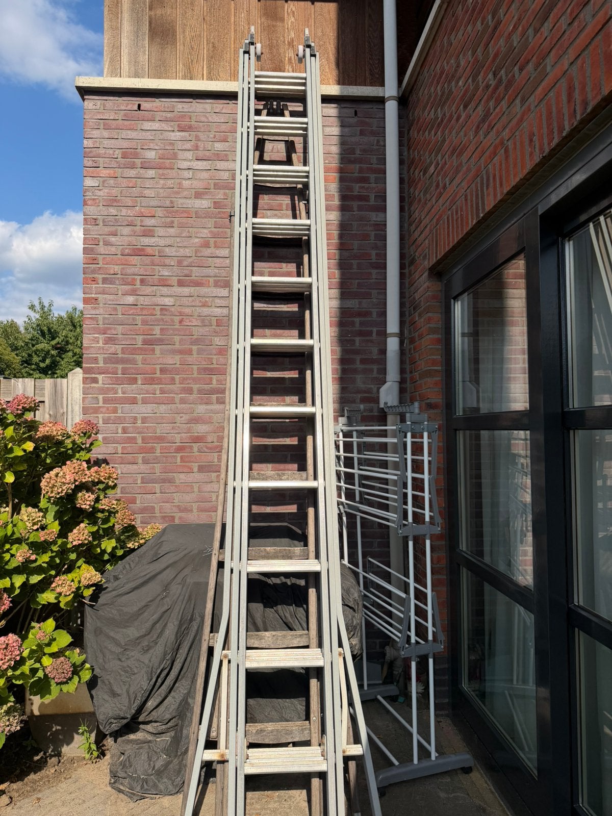 Glazenwassers ladders, Ophalen of Verzenden, Zo goed als nieuw, 4 meter of meer