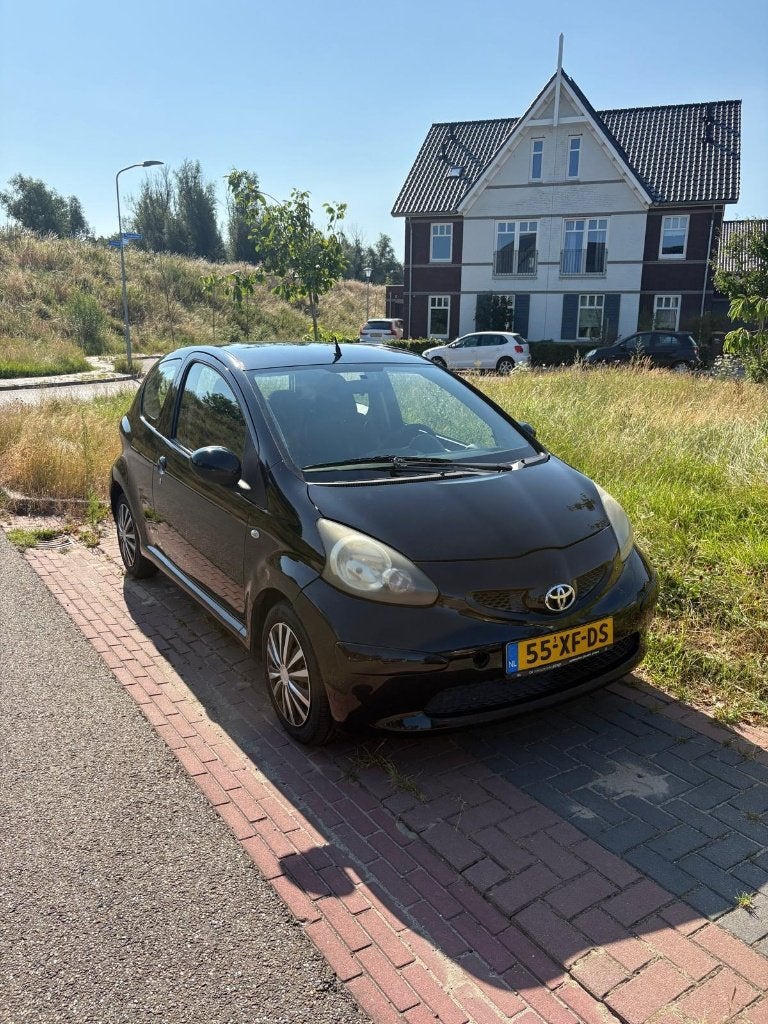 Toyota Aygo 1.0 12V Vvt-i 3DRS MMT 2007 Zwart, Auto's, Voorwielaandrijving, Stof, Zwart, 4 stoelen