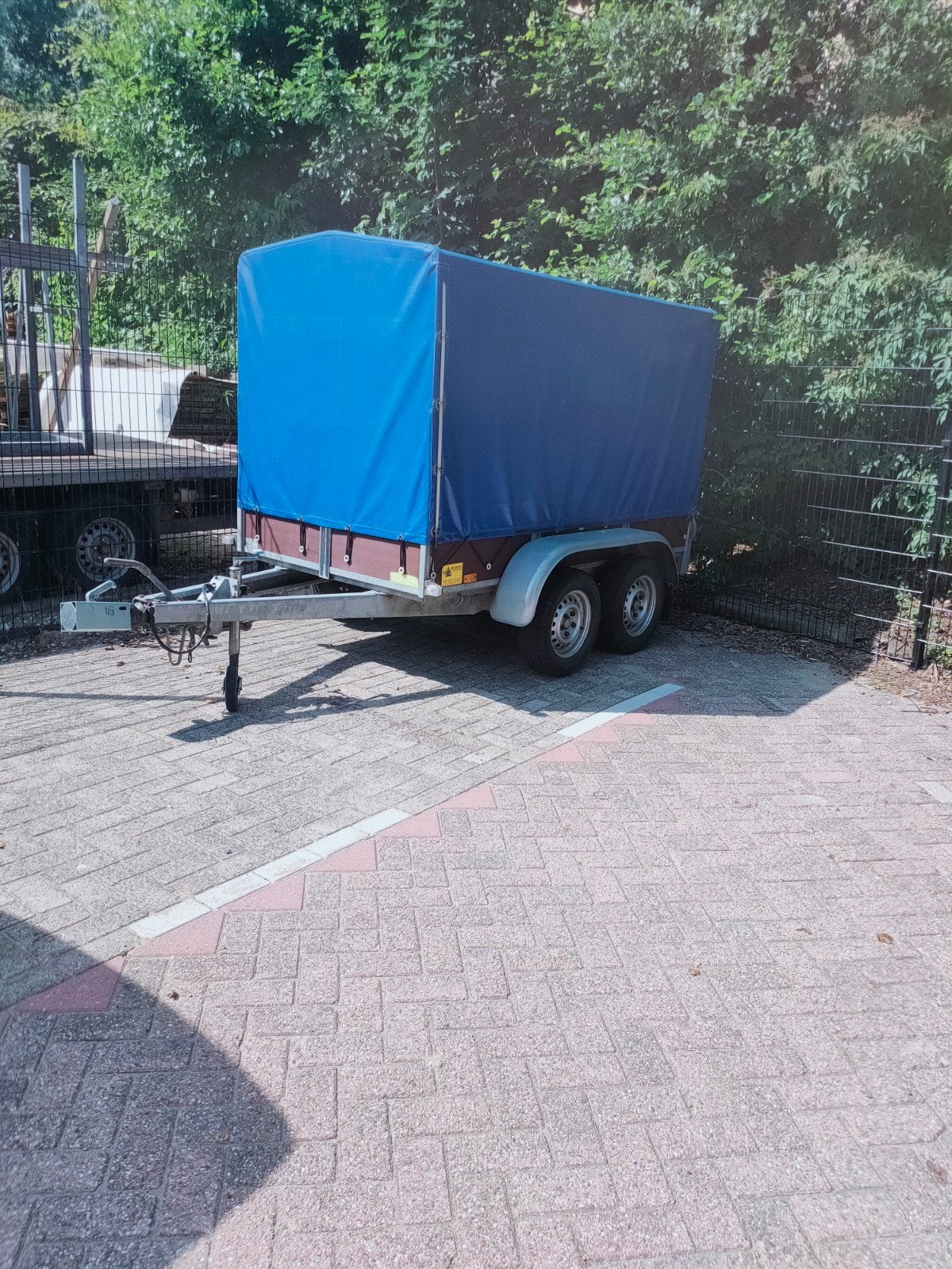 Ruime gesloten tandemasser te koop, Ophalen