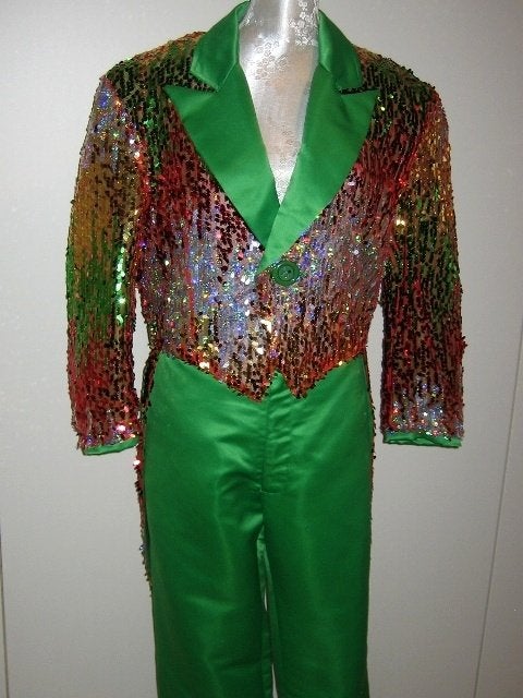 Te koop aangeboden: slipjas met pantalon en glitterhoed., Carnaval, Maat 48/50 (M), Nieuw, Ophalen of Verzenden