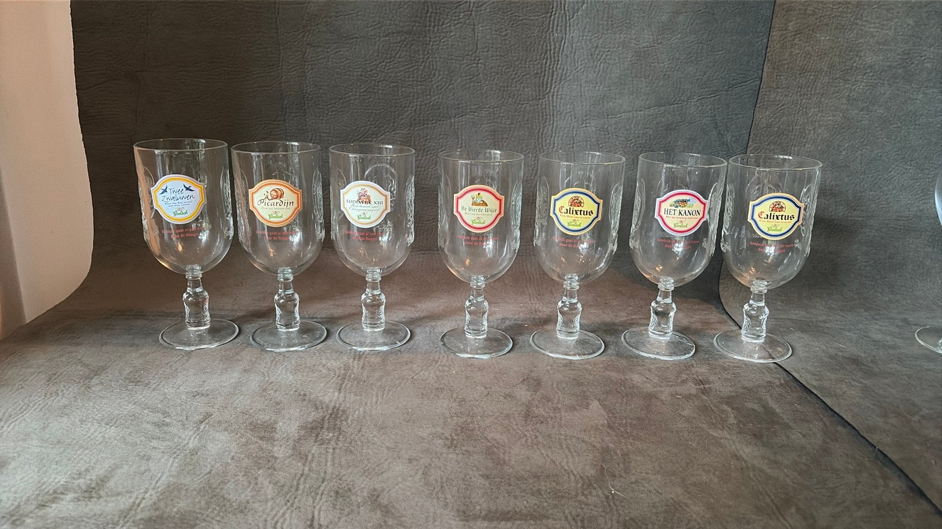 Grolsch bierglazen - Set van 7 verschillende glazen, Ophalen of Verzenden, Meerkleurig, Overige merken, Glas
