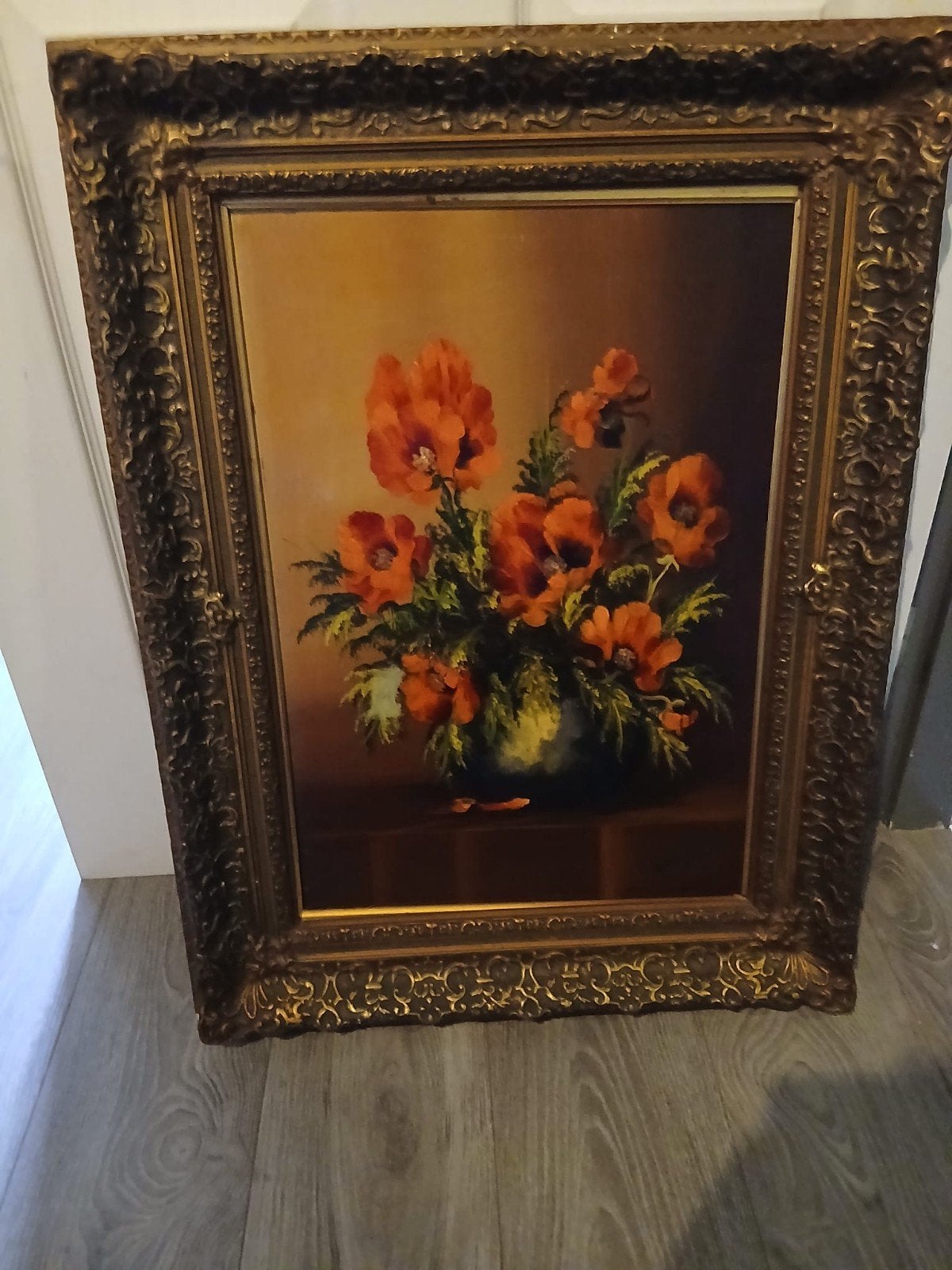 Schilderij met klaprozen in sierlijke lijst, Ophalen