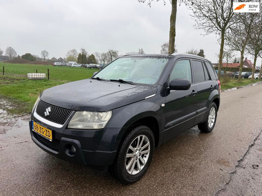 Suzuki Grand Vitara 2.0-16V Limited 4x4, Auto's, Stof, Zwart, 4 cilinders, 1850 kg
