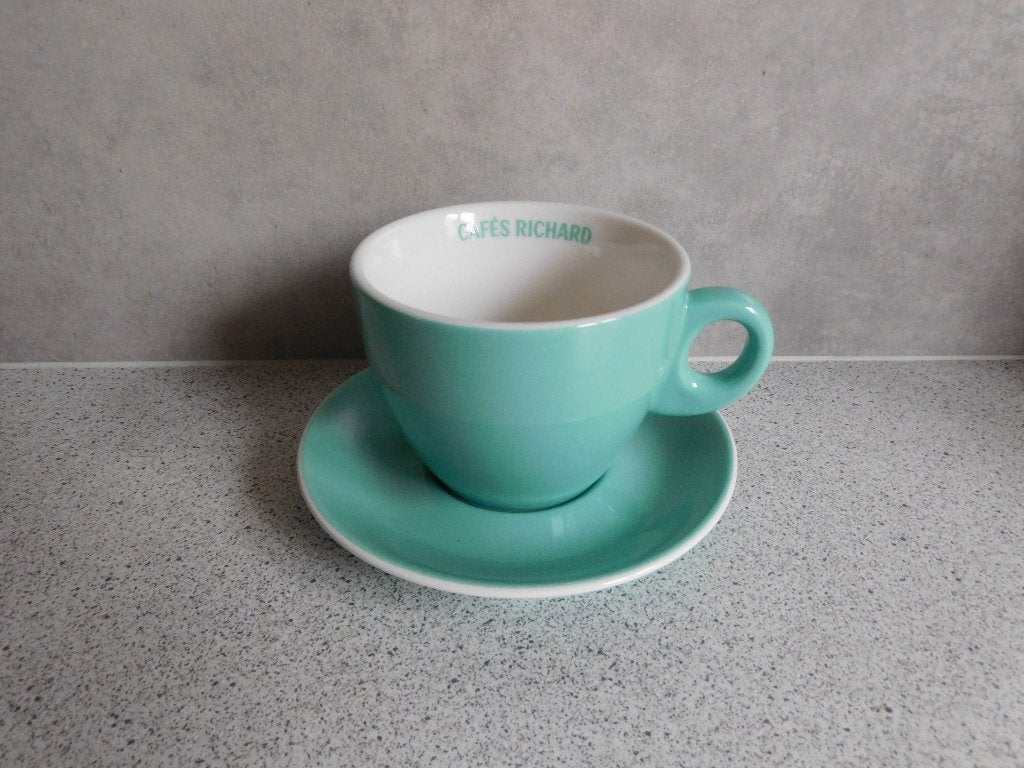 Kop en schotel Cappuccino Turquoise Cafés Richard Paris, Ophalen of Verzenden, Zo goed als nieuw, Overige stijlen, Kop(pen) en/of Schotel(s)