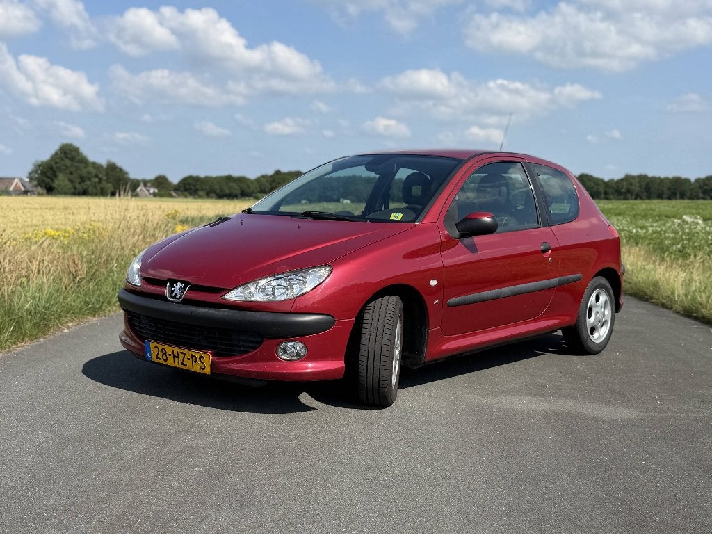 Peugeot 206 1.4 X-line 3D 2002 Rood - Lederen interieur, Auto's, Peugeot, Voorwielaandrijving, 4 cilinders, Particulier, 1100 kg