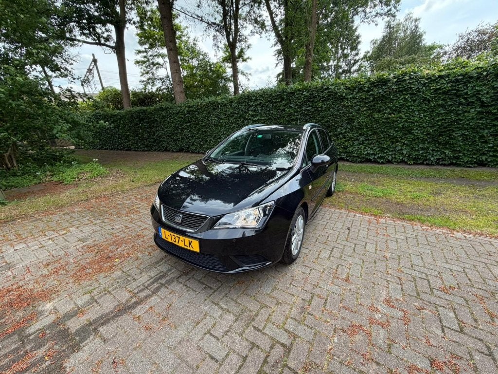 Seat Ibiza 1.2 51KW ST 2013 Zwart, Auto's, Voorwielaandrijving, Euro 5, Stof, Zwart