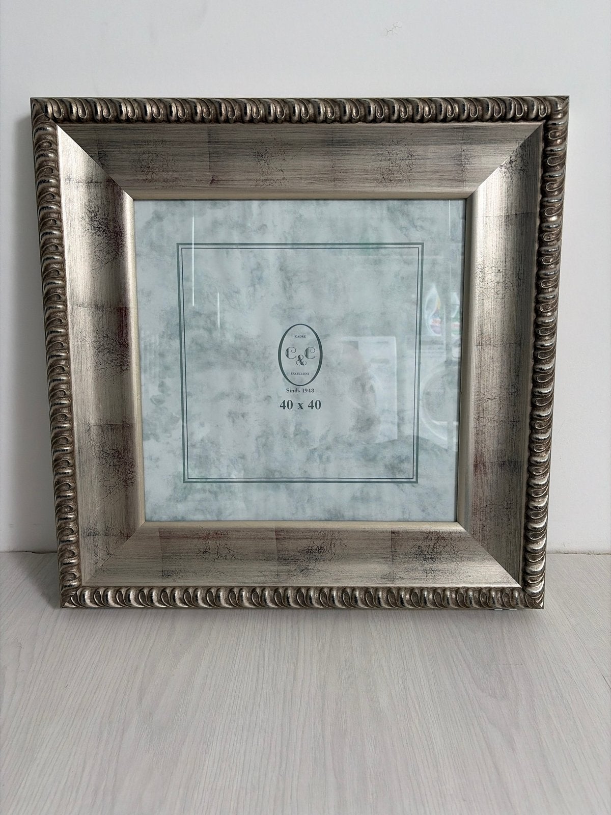 Barokke zilverkleurige fotolijst (50x50 buiten/40x40 binnen), Ophalen, Zo goed als nieuw, Fotolijst, Met glas
