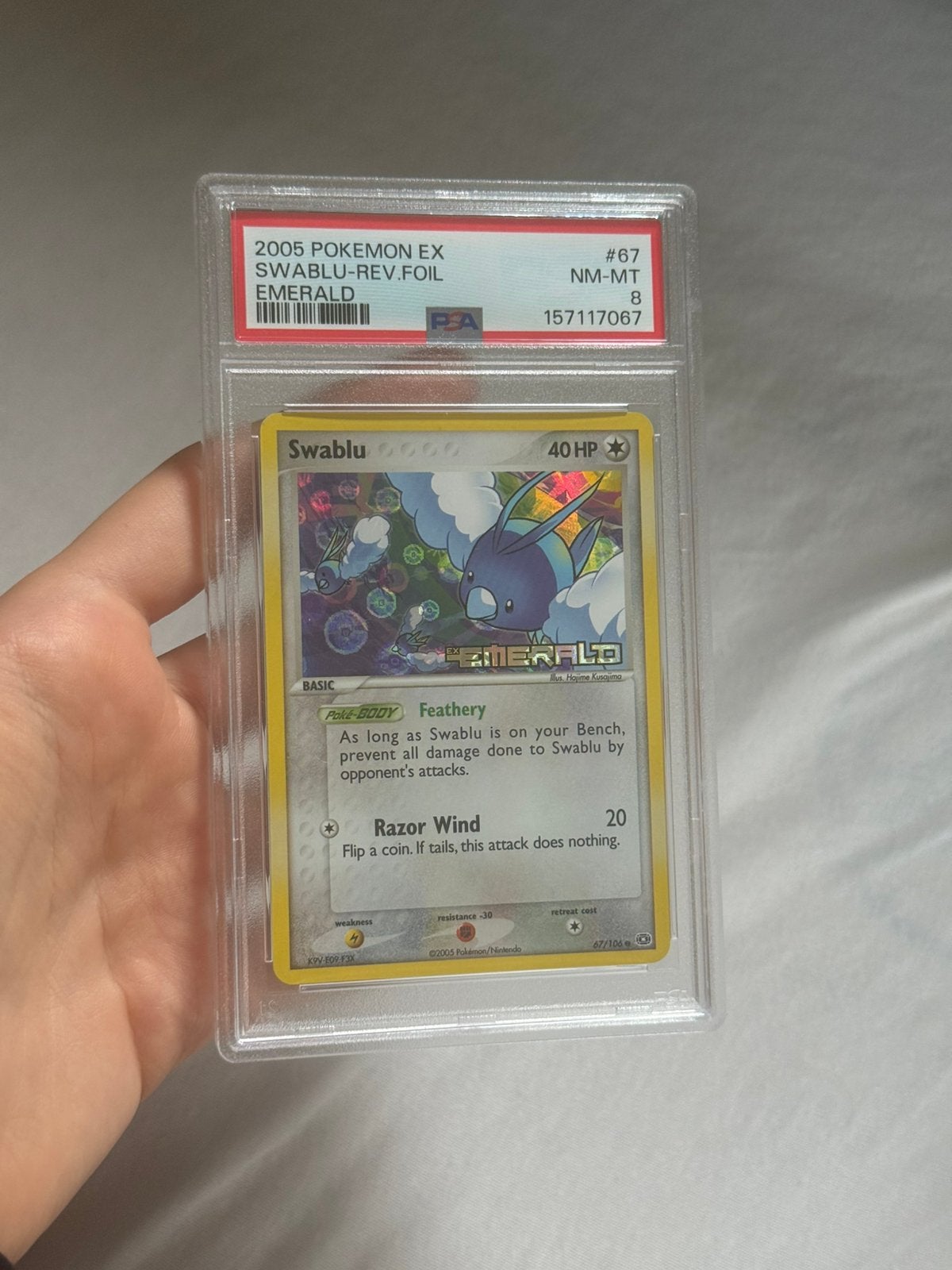 Swablu Reverse Holo #67 PSA 8 - 2005 EX Emerald, Ophalen of Verzenden, Zo goed als nieuw