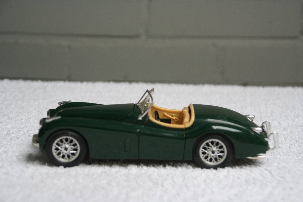 1:24 Bburago Jauguar XK120 (1948) groen (7), Ophalen of Verzenden, Gebruikt, Auto, Bburago