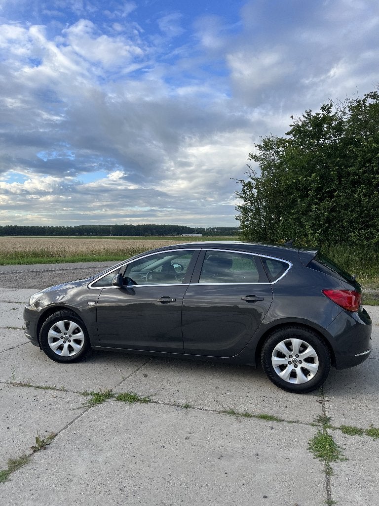 Opel Astra 1.4 Turbo Ecotec 88KW 5D 2015 Grijs, Voorwielaandrijving, Stof, 4 cilinders, Multifunctioneel stuurwiel