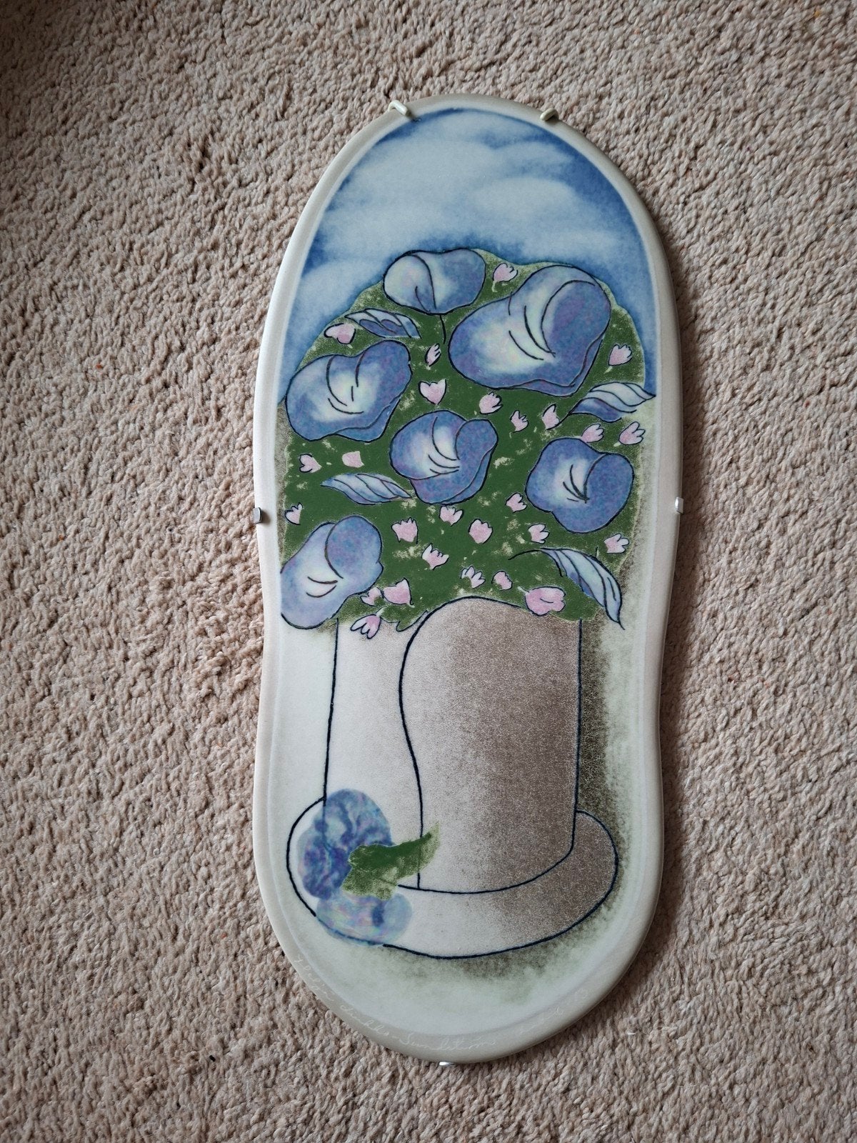 Keramische wanddecoratie met bloemenmotief, Ophalen