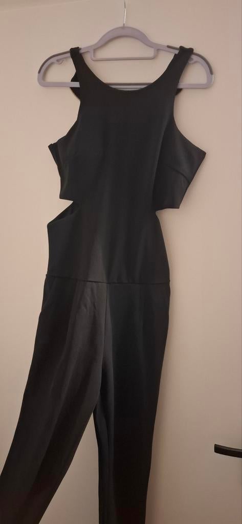 Zwarte jumpsuit met cut-outs en gouden rits, Kleding | Dames, Jumpsuits, Zwart, Ophalen of Verzenden, Maat 36 (S), Onbekend