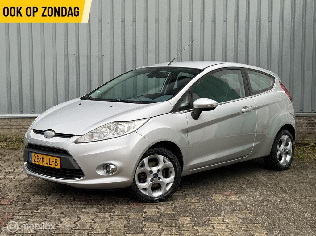 Ford Fiesta 1.25 Titanium | Climate | Parkeer Sens. | Aux, Auto's, Voorwielaandrijving, Euro 5, Stof, 4 cilinders