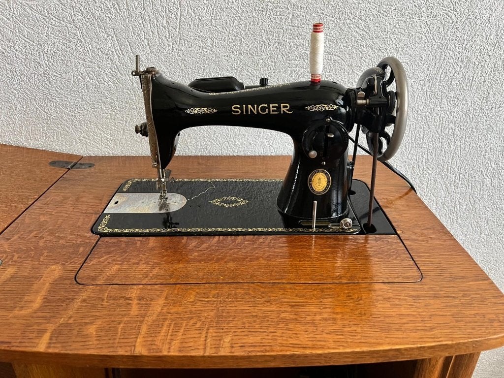 antiek singer naaimachine, Ophalen