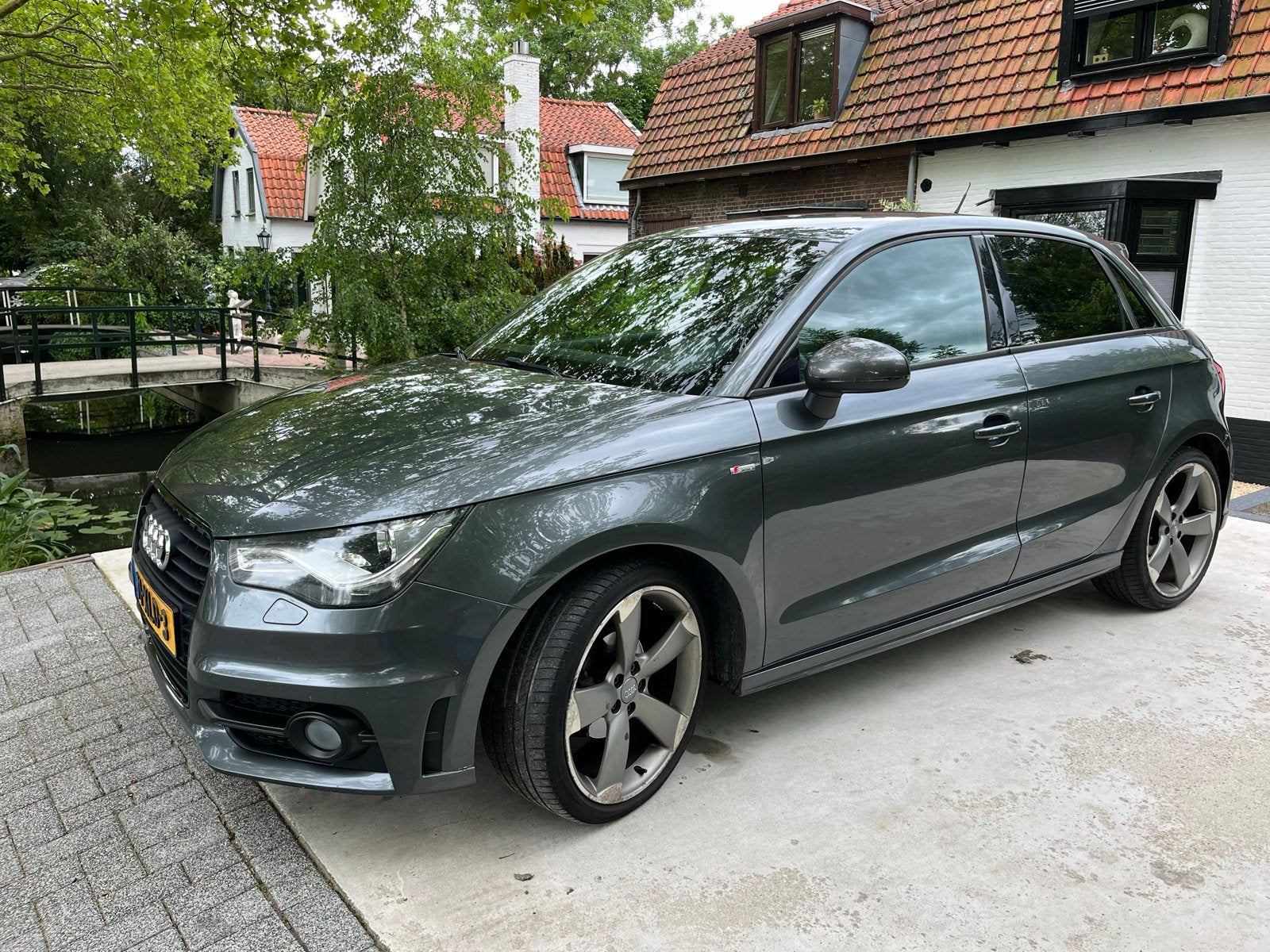 Audi A1 1.2 Tfsi 63KW SB 2012 Grijs, Auto's, Audi, Voorwielaandrijving, Euro 5, A1, Zwart