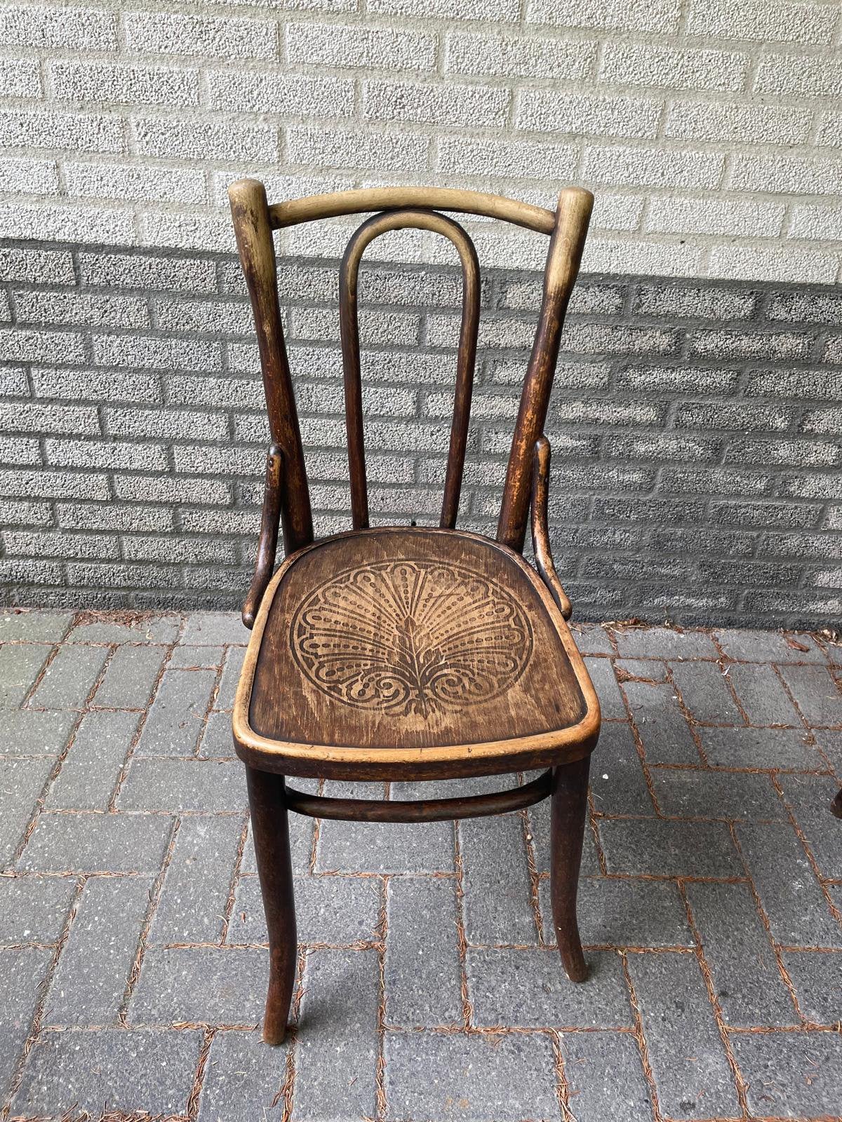 14 antieke café stoelen, Ophalen
