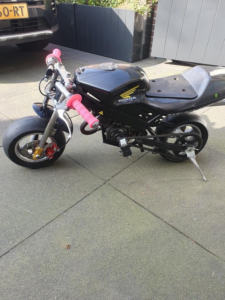 Minibike met opklapbare stapjes nieuwe remmen en cabarateur, Fietsen en Brommers, Minibikes, Midibikes en Pitbikes, Ophalen of Verzenden