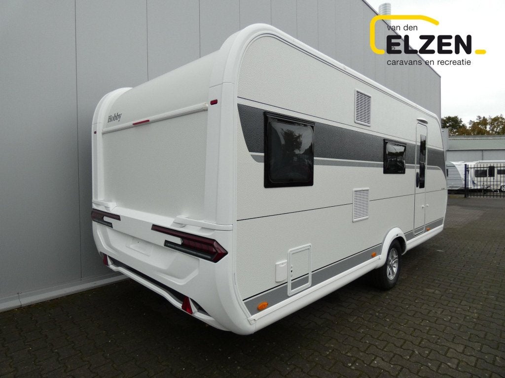 Hobby De Luxe 545 KMF actie prijs, incl. opties, Caravans en Kamperen, Caravans, Schokbreker, Hobby, Bedrijf, Treinzit