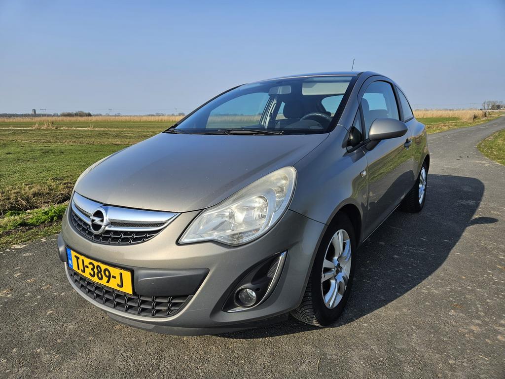 Opel Corsa 1.2 16V 3D 2011 Bruin, Auto's, Opel, Voorwielaandrijving, 450 kg, 40 €/maand, Bruin