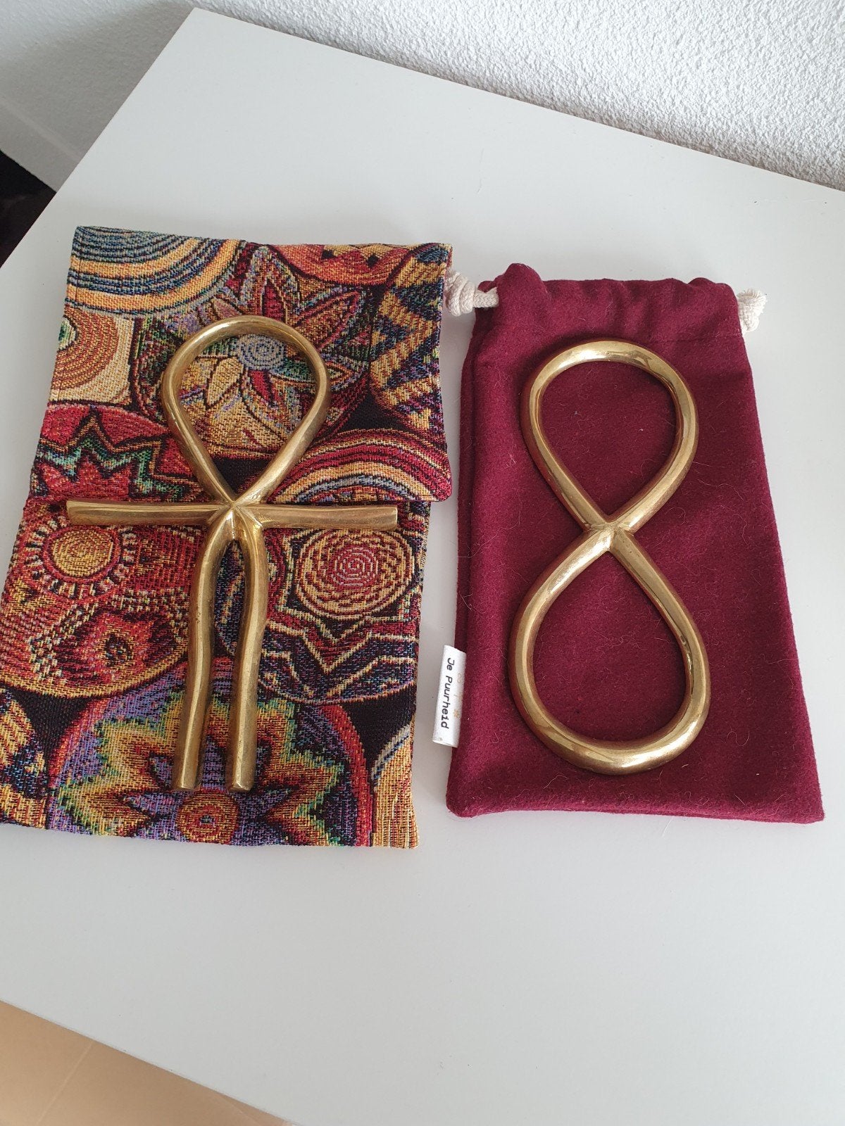 gegoten Ankh en Lemniscaat, Ophalen of Verzenden, Zo goed als nieuw