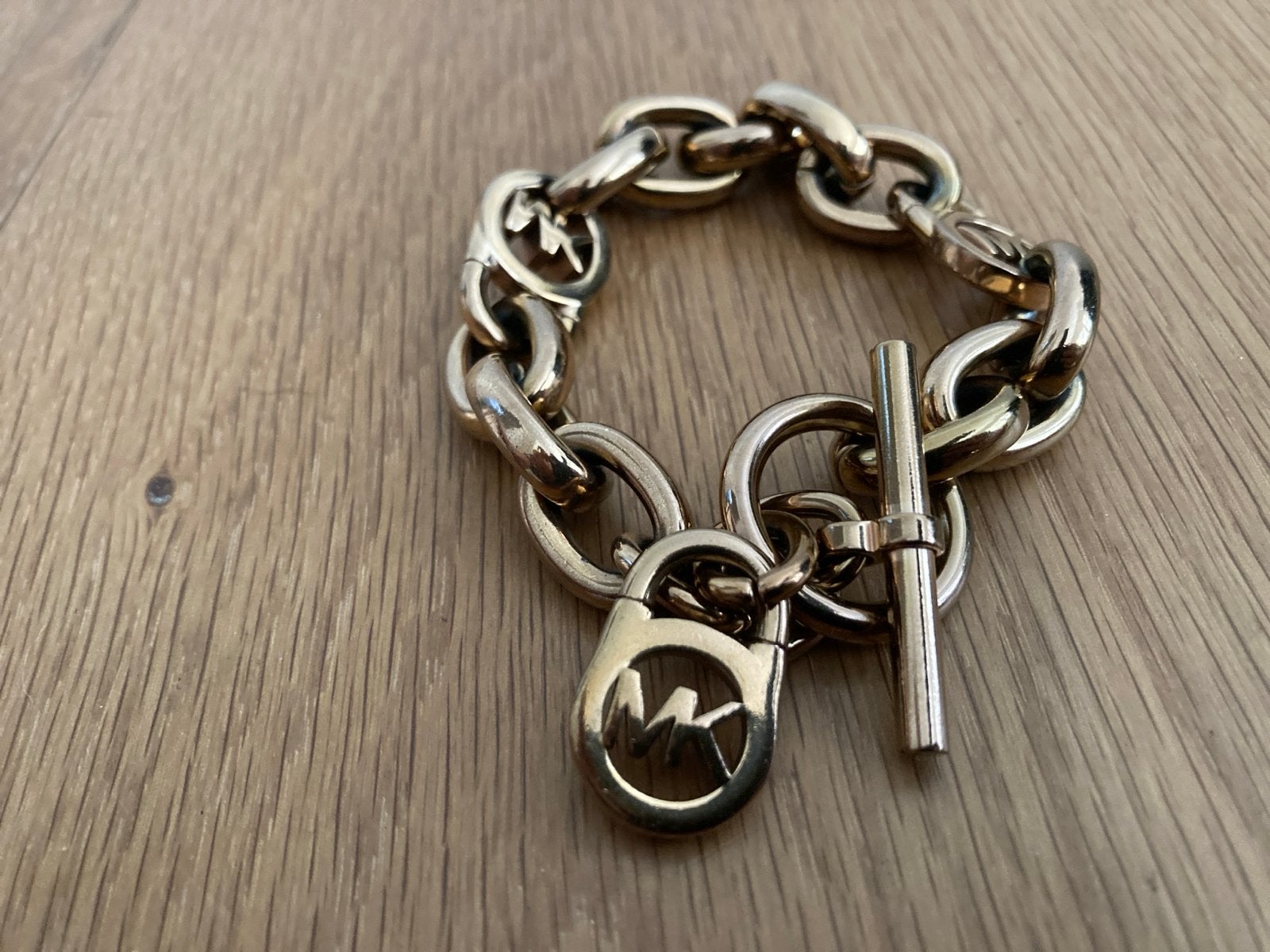 Michael Kors Rose Goudkleurige Schakelarmband, Sieraden, Tassen en Uiterlijk, Armbanden, Ophalen of Verzenden, Zo goed als nieuw
