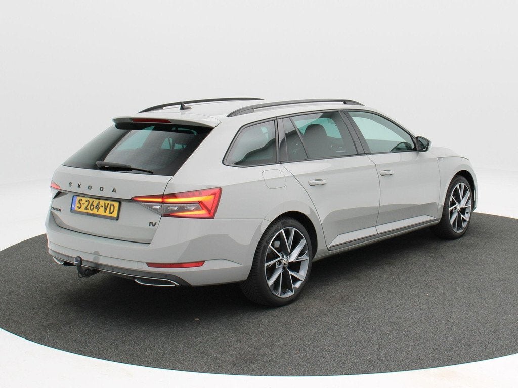 Skoda Superb Combi 1.4 TSi 218 Pk iV Sportline Business | Tr, Auto's, Skoda, Gebruikt, 4 cilinders, Alcantara, 1668 kg
