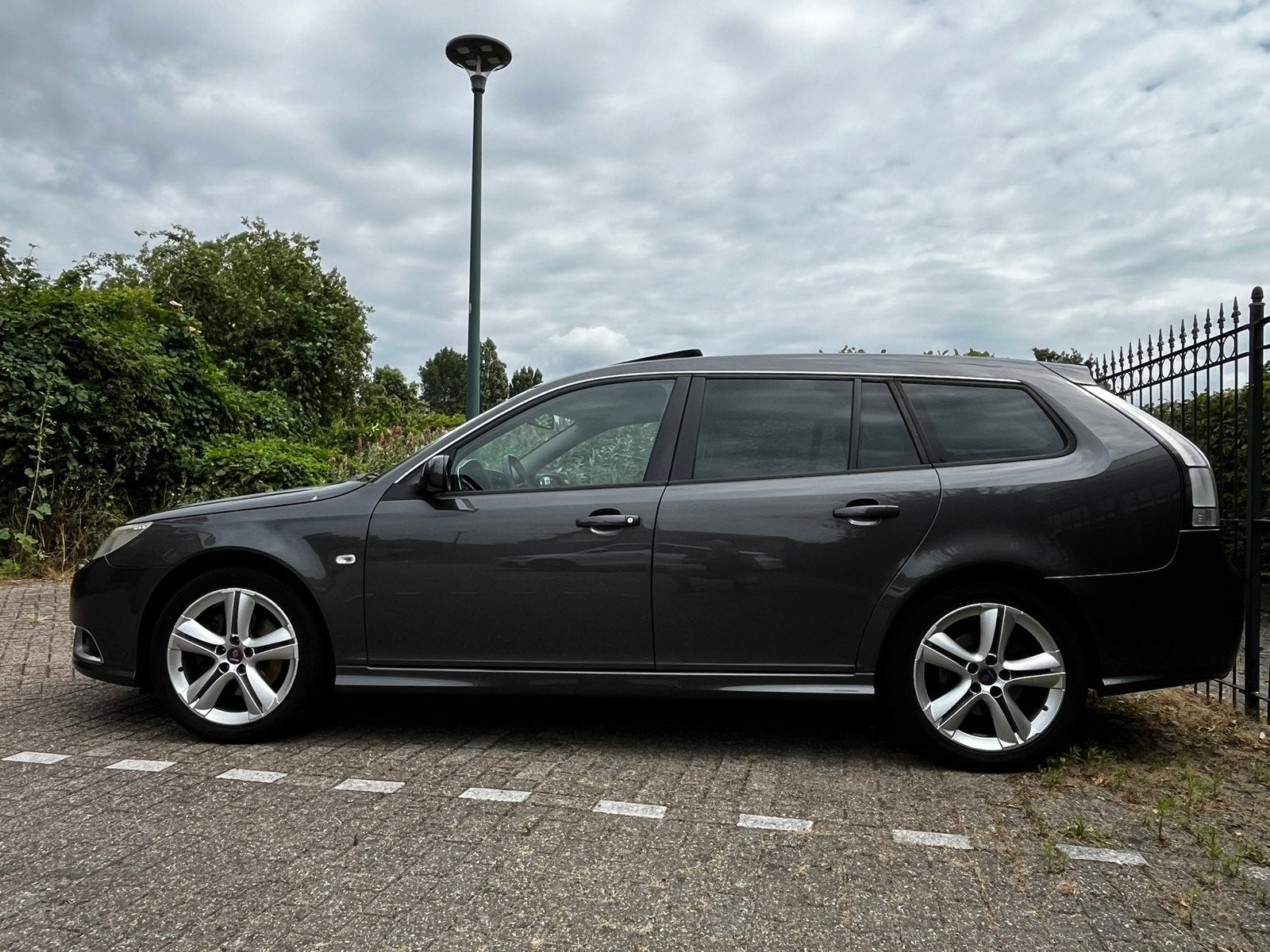 SAAB 9-3 2.0 Aero Estate XWD schuifdak, modeljaar 2009, Beige, 4 cilinders, Leder, Stationwagon