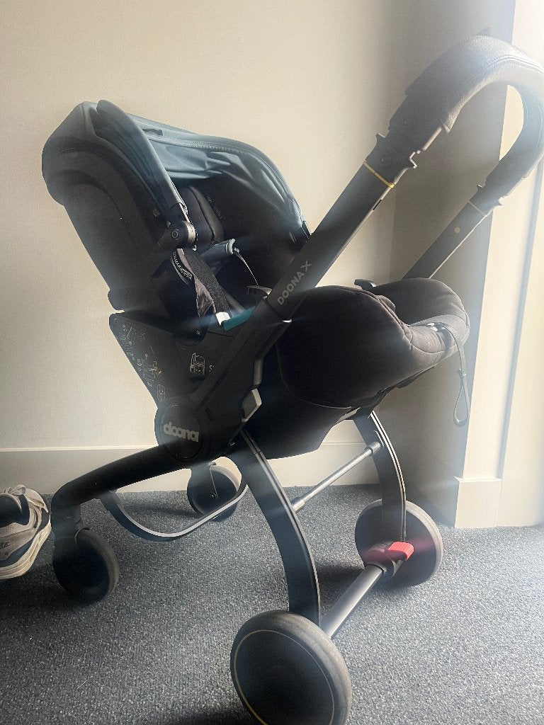 Doona X met isofix base - Ocean Blue, Zo goed als nieuw, Isofix, 0 t/m 13 kg, Slaapstand