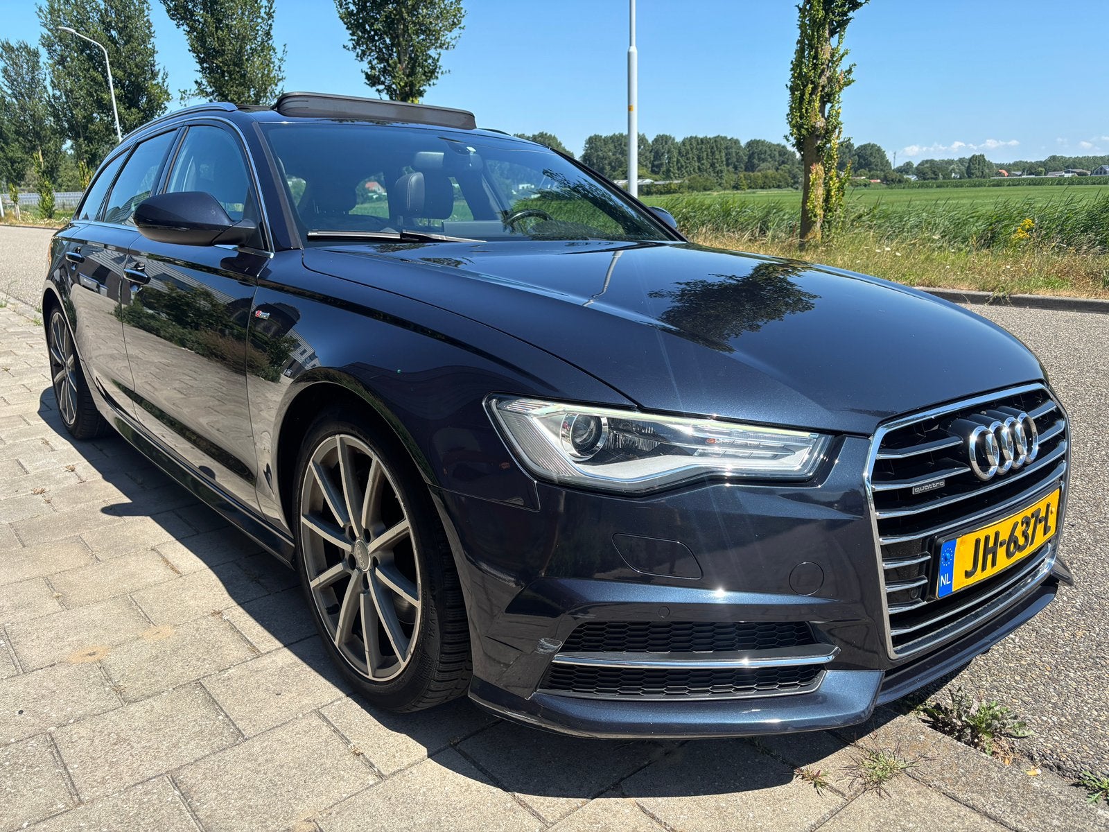 Audi A6 Avant 2.0 TFSI quattro S-line Bose Pano NAP logisch, Automaat, Blauw, Stationwagon, Vierwielaandrijving